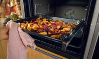 Air Fry Function with Air Fry & Grill Tray: for crispy chicken, veggies and chips.