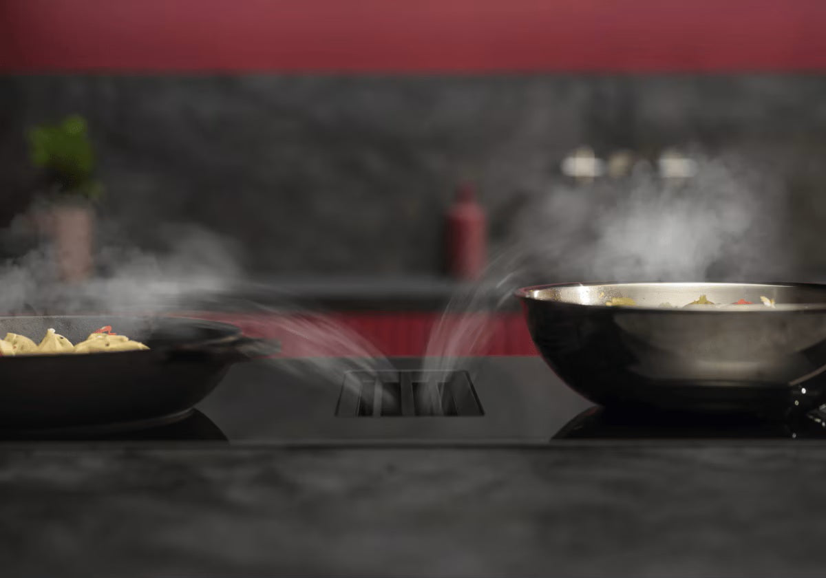 Automatic Extractor Control. Adjusts as you cook