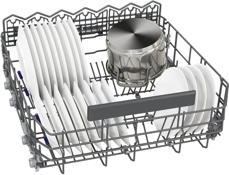 Dishwasher rack with cutlery and plates on a white background