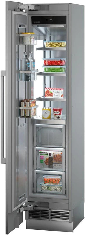 liebherr egn9171 monolith integrated freezer with open door and freezer compartment filled with food items. Angled slightly to the left.