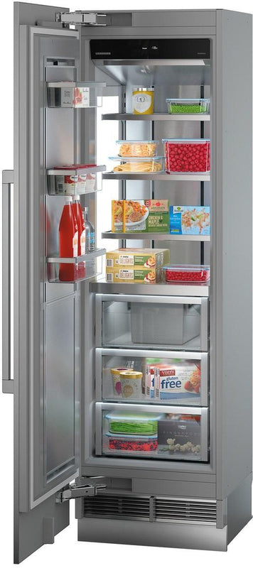 liebherr egn9271 monolith integrated freezer with door open. Freezer compartment is filled with food items. The freezer is angled slightly to the left.