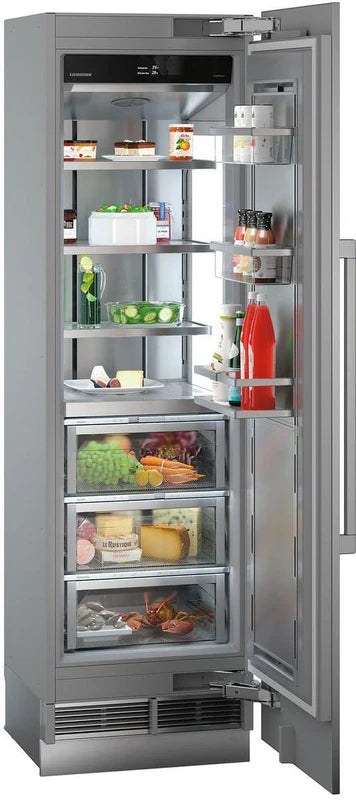 liebherr ekb9271 monolith integrated fridge with open door and food items inside angled slightly to the right .